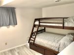 Downstairs 4th bedroom has a twin over full bunkbed setup - perfect for the kids